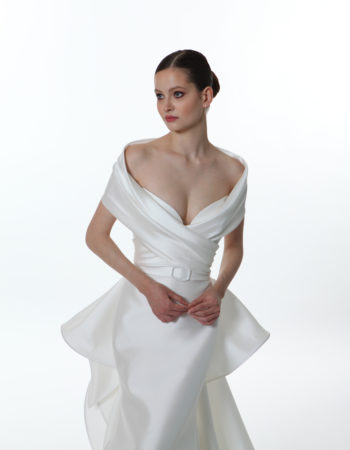 Closeup of Valentini Spose E0755 off the shoulder pleated neckline with optional belt and removable train