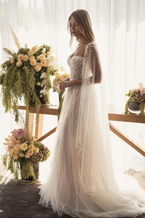 Lee Petra Grebenau Kaia beaded a line wedding dress wtih pearl accents and matching cape dimitras bridal couture