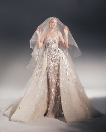 Zuhair Murad fall 2022 katie wedding dress at dimitras bridal in chicago featuring a fully beaded tulle sheath bridal gown with straps, with a matching beaded tulle overskirt and veil