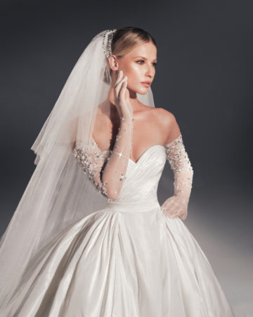 Zuhair Murad fall 2022 kendell wedding dress at dimitras bridal chicago featuring a strapless sweetheart ruched taffeta ball gown with beaded illusion gloves and matching veil