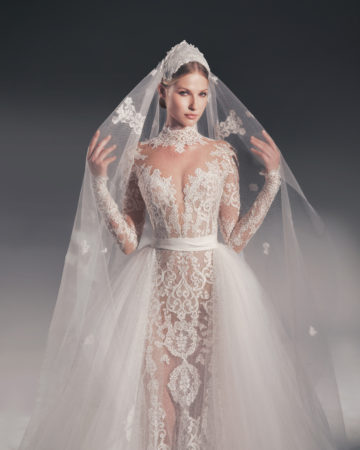 Zuhair Murad fall 2022 kylie wedding dress at dimitras bridal chicago featuring a long sleeve high neck lace mermaid wedding dress with matching overskirt and veil