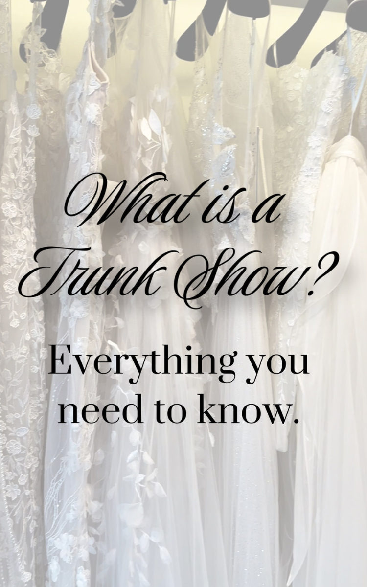 Vertical image of wedding gowns hung on hangers featuring lace and floral embroidery. The text overlay reads "What is a Trunk Show? Everything you need to know" with a Dimitra's Bridal Logo on it.