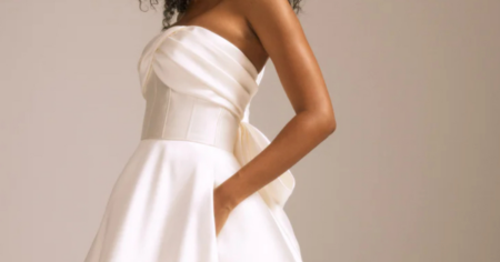 amsale satin corseted wedding gown with bow detail down the back