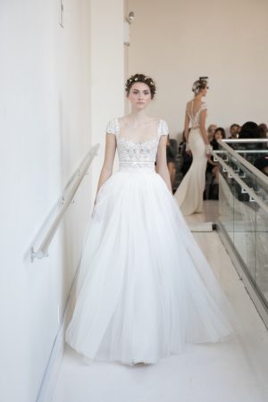 reem-acra-angela-fall-2017-wedding-gown-dimitras-bridal-chicago-with-embroidered-lace-bodice-cap-sleeves-bow-detail-and-tulle-a-line-skirt