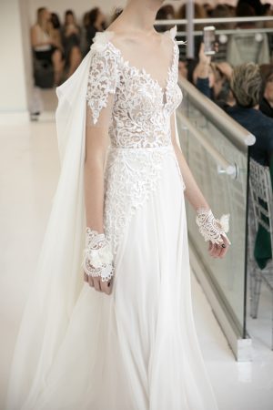reem-acra-katia-fall-2017-wedding-dress-dimitras-bridal-chicago-on-the-shoulder-cap-sleeve-embroidered-natural-waist-organza-a-line-gown-with-removable-cape